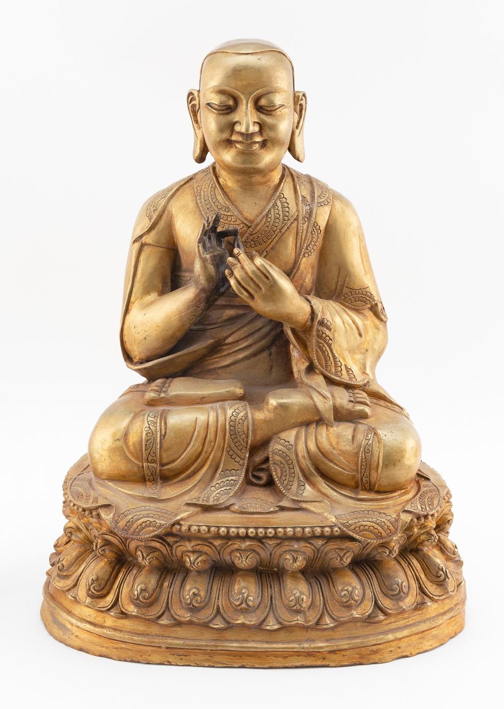 CHINESE GILT-BRONZE FIGURE OF