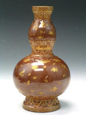 CHINESE GILTED BROWN GLAZE POR