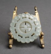 CHINESE HARDSTONE AMULET ON ST