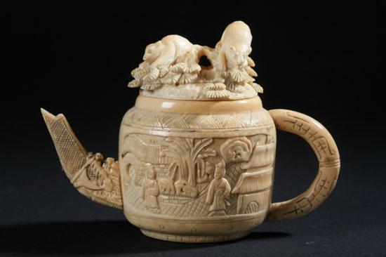 CHINESE IVORY TEA POT. Two