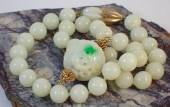 CHINESE JADE AND FOURTEEN KARA