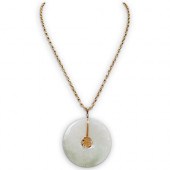 CHINESE JADE DISK AND 18K GOLD