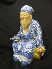 Chinese Mudman Figurine seated