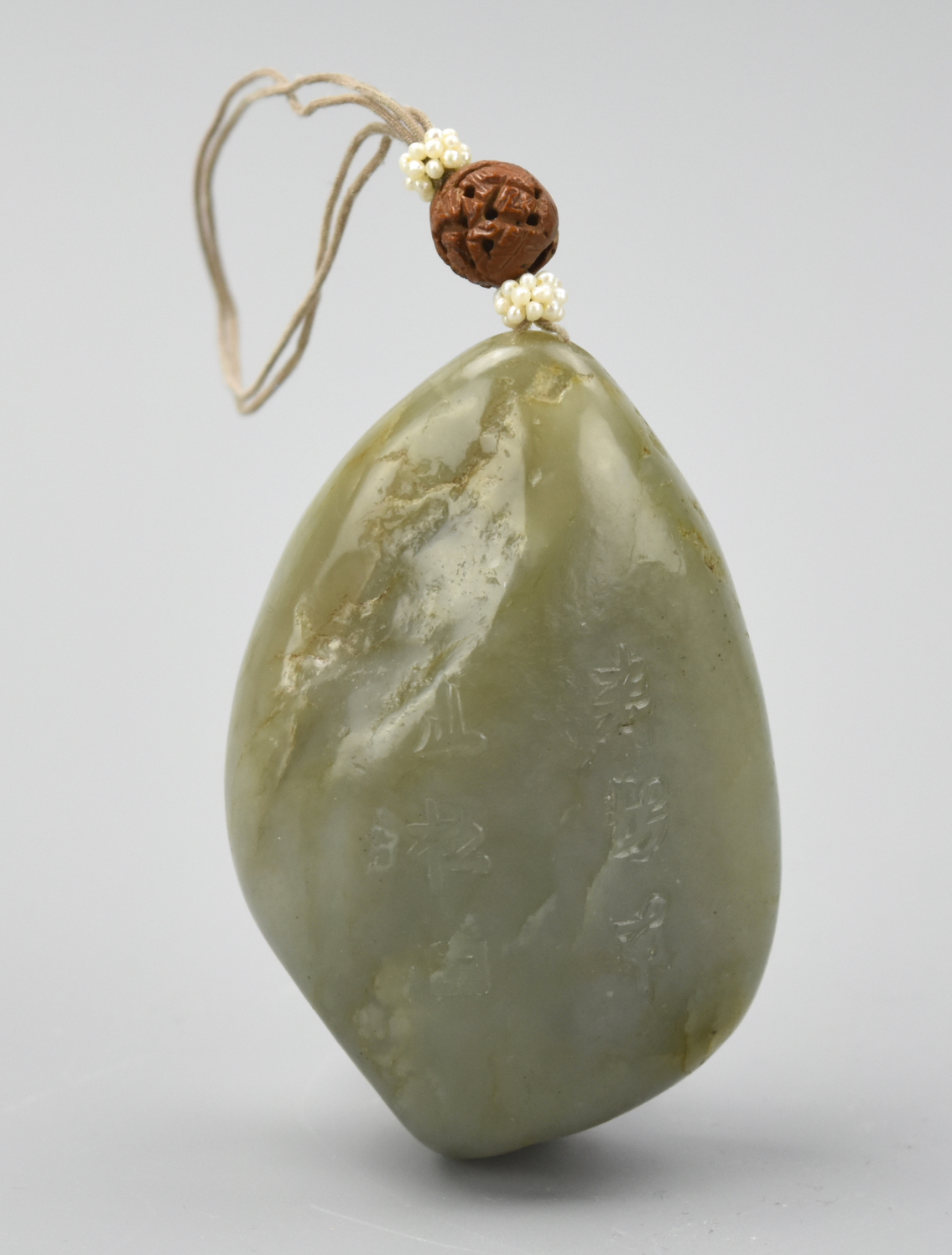 CHINESE NATURAL FORM CARVED JADE