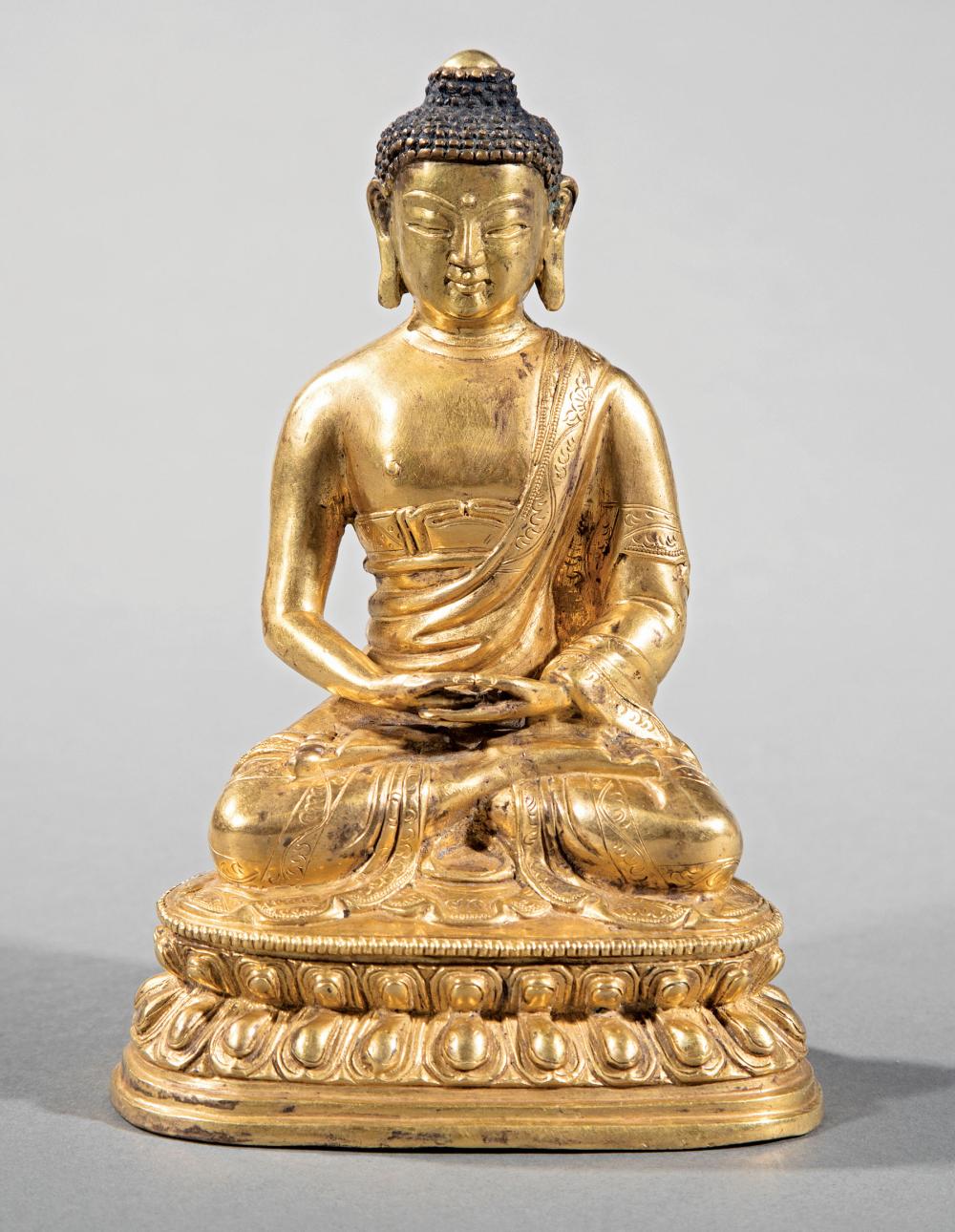 CHINESE OR TIBETAN GILT BRONZE
