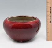 CHINESE OX BLOOD SQUAT VASE: 1