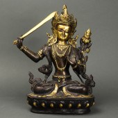 CHINESE PARCEL-GILT FIGURE OF