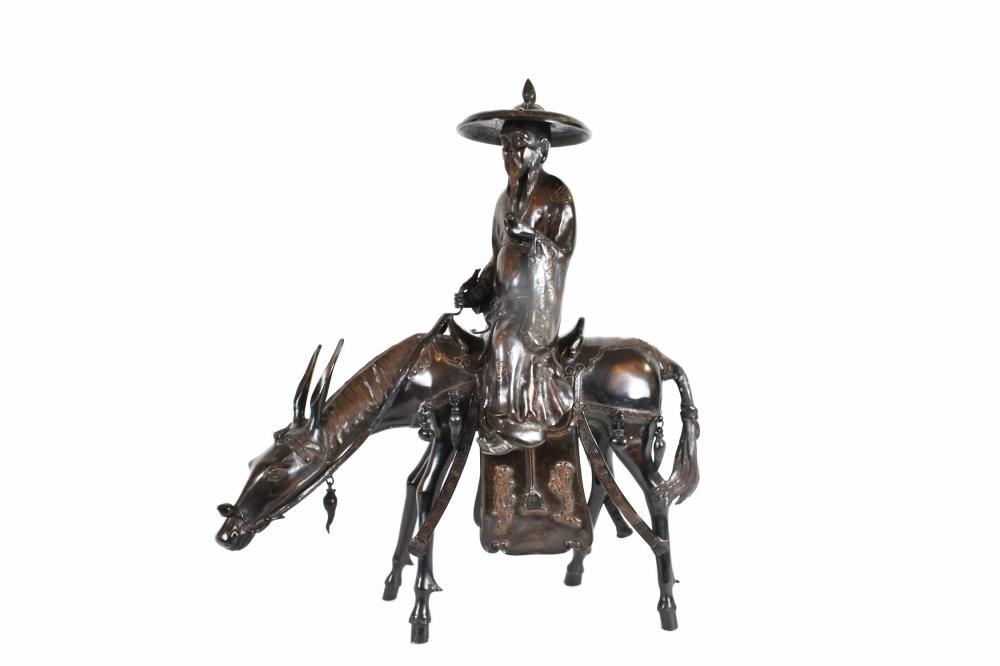 CHINESE PATINATED BRONZE OF A
