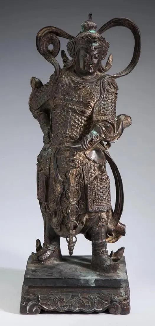 CHINESE PATINATED BRONZE STATUE