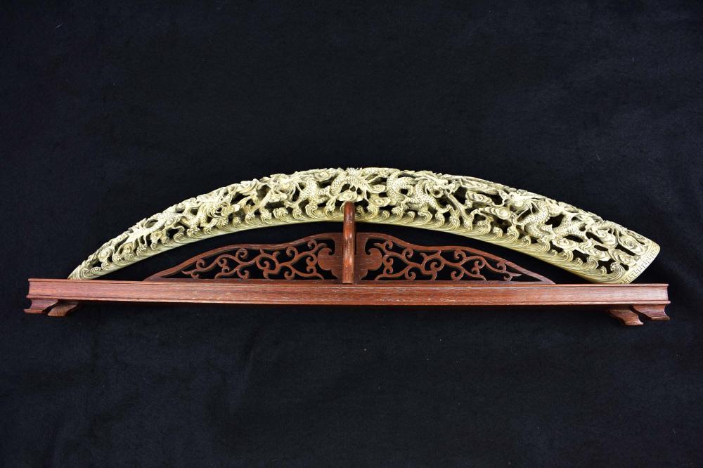 CHINESE PIERCED DRAGON TUSK