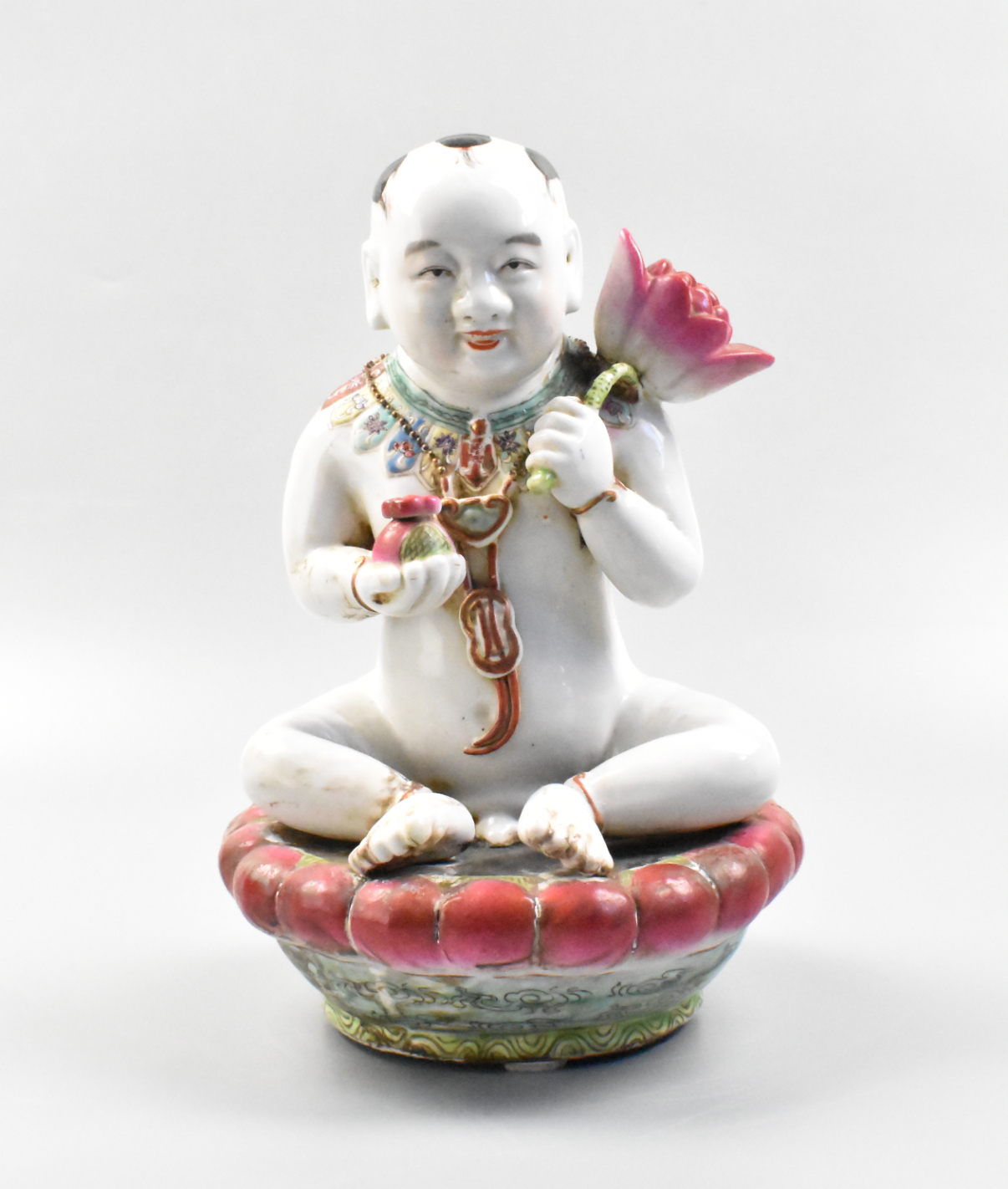 CHINESE PORCELAIN BOY FIGURE ON