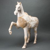 CHINESE POTTERY FIGURE OF A PR