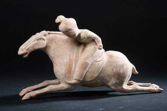 CHINESE POTTERY FIGURE OF FEMALE