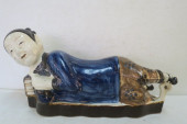 CHINESE RECLINING MALE PORCELA