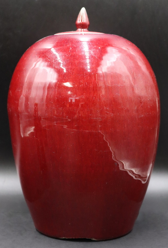 CHINESE SANG DE BEOUF LIDDED JAR.