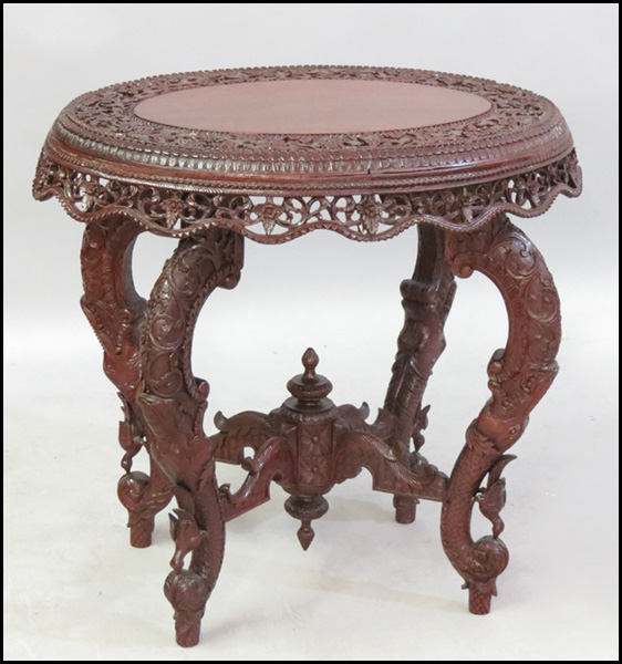 CHINESE TEAK OVAL TABLE. H: 31'' W:
