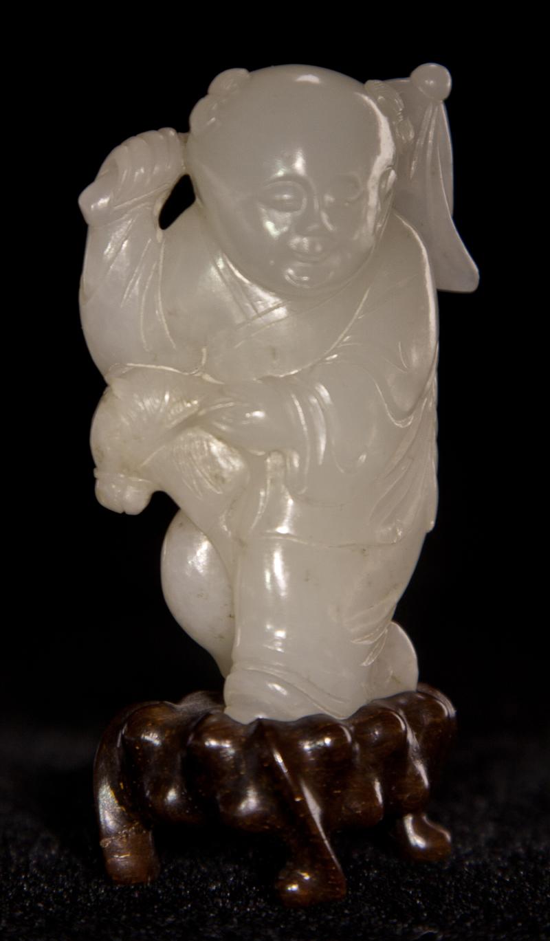 CHINESE WHITE JADE CARVING OF A BOY