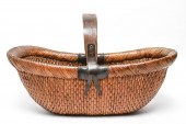 CHINESE WOVEN RATTAN BASKET, A