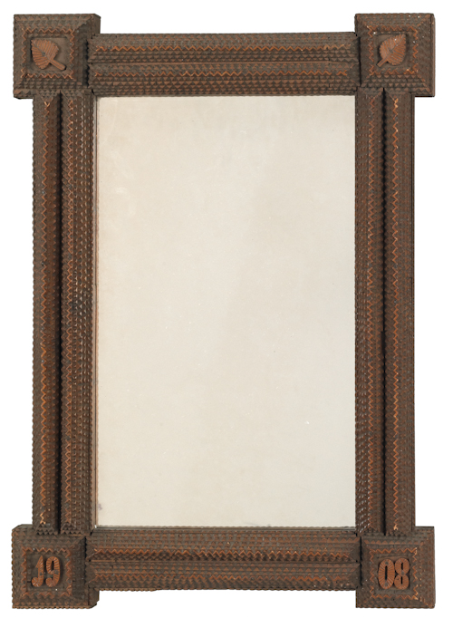 Chip carved tramp art mirror