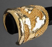 CHRISTIAN LACROIX GOLD-TONE HE