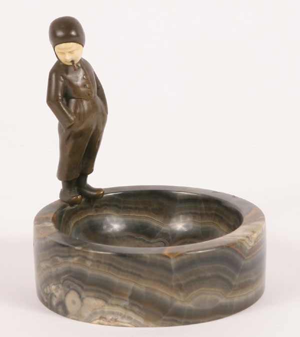 Cigar smoking bronze boy