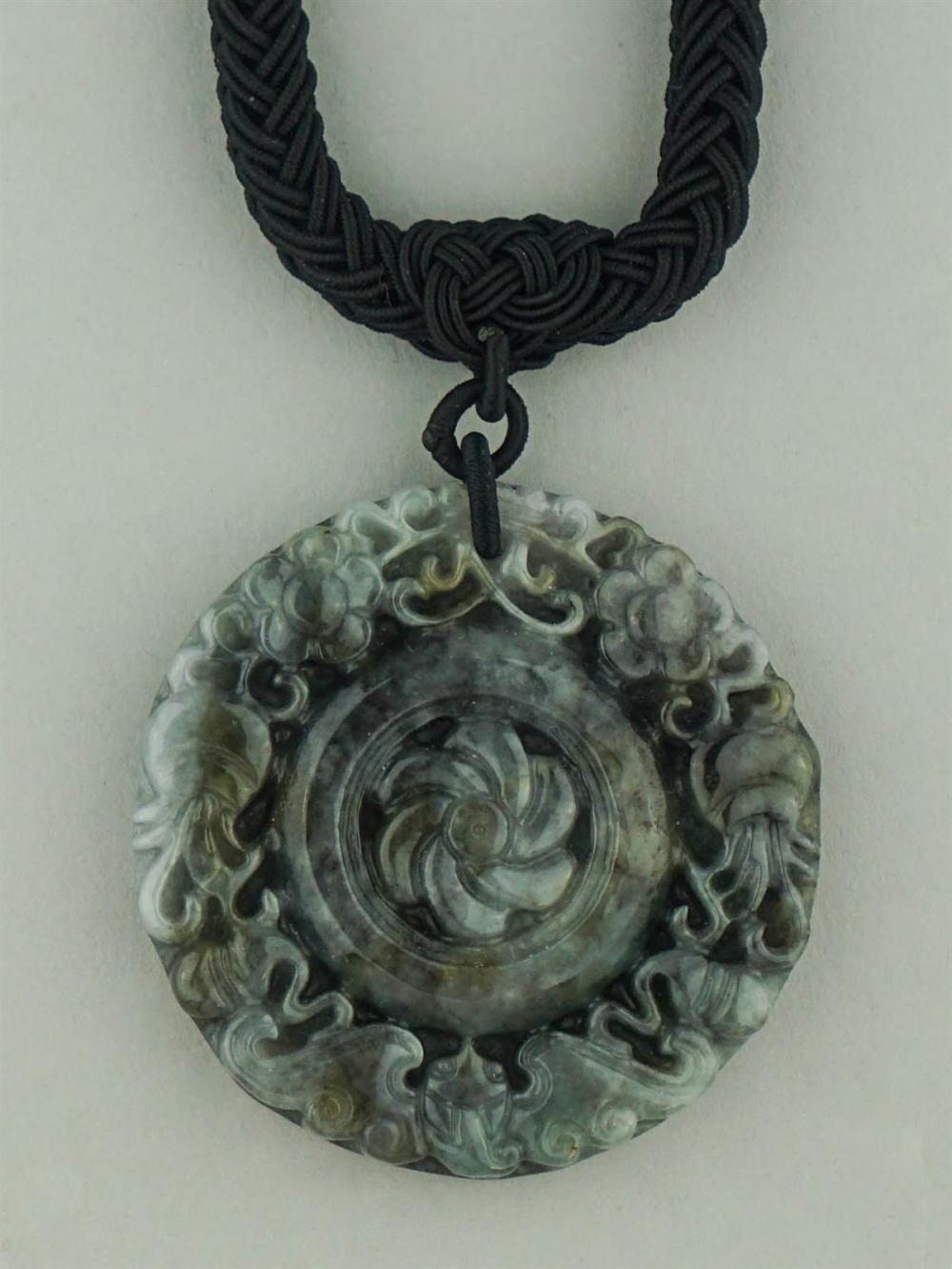 CIRCULAR JADE GLASS PENDANT ON HAND