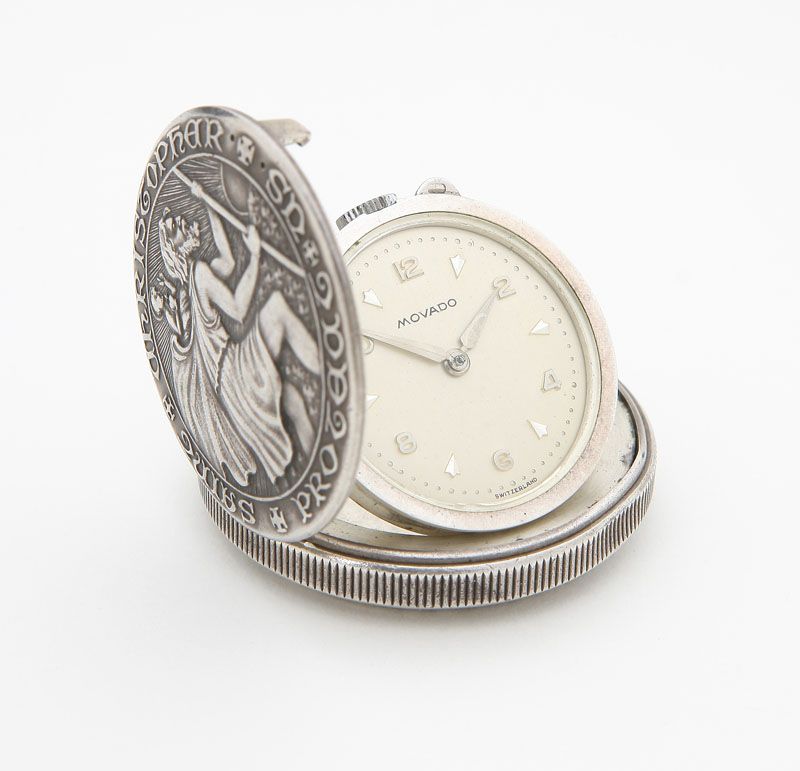 Circular silvered dial with applied