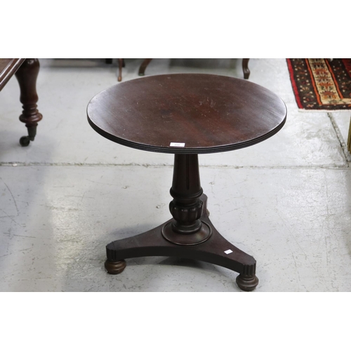 Circular topped side table,