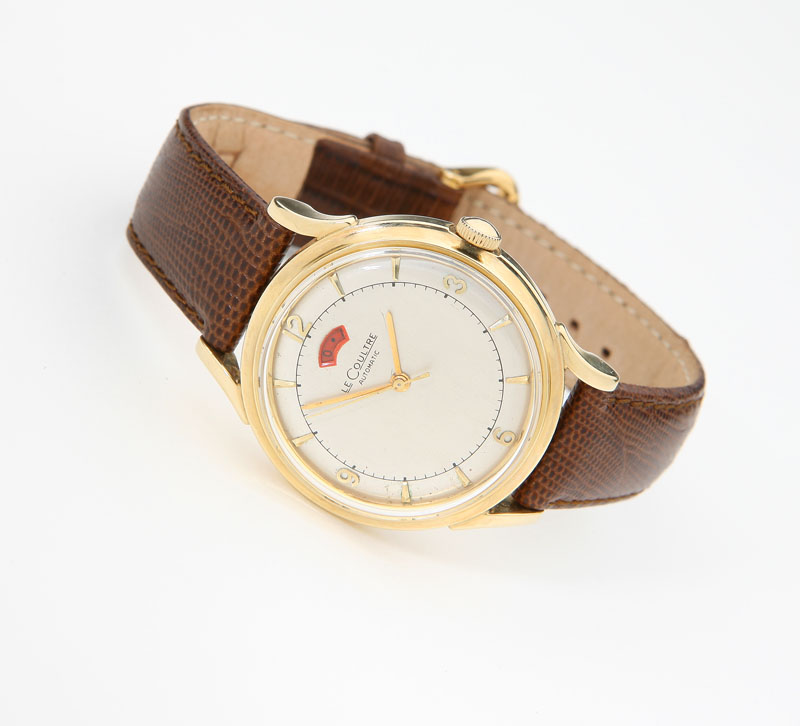 Circular two tone silvered dial