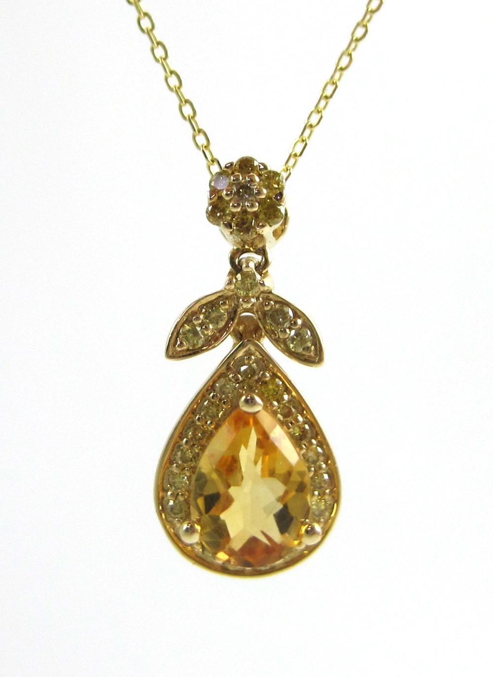 CITRINE AND FOURTEEN KARAT GOLD