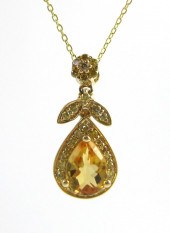 CITRINE AND FOURTEEN KARAT GOL
