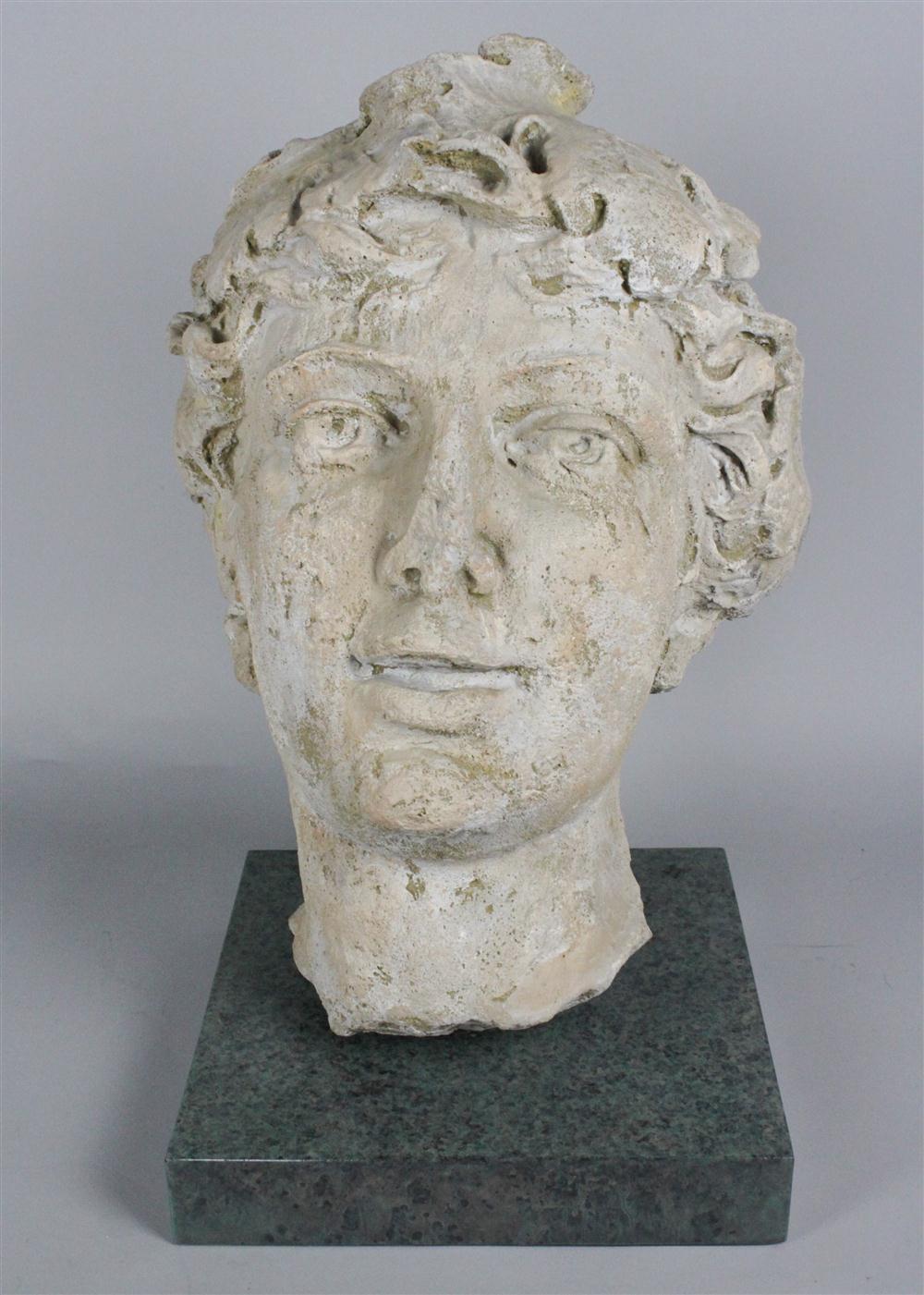 CLASSICAL HEAD ON A GREEN STONE
