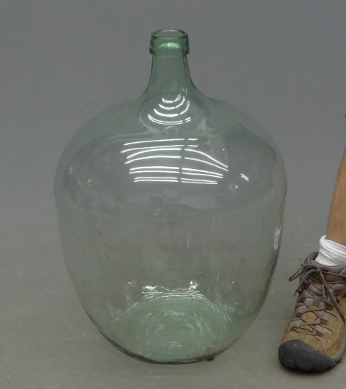 Clear glass demi jon jar. 25''