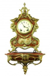 CLOCK: LOUIS XV STYLE BURL AND
