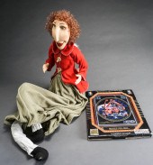 CLOTH AND PORCELAIN FIGURE OF