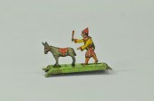 CLOWN CHASING DONKEY PENNY TOY