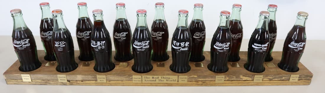 COCA COLA THE REAL THING AROUND THE