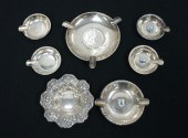COIN INSERT ASH TRAY, A NUT DI