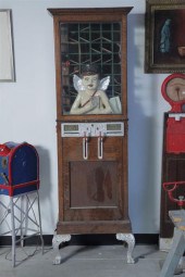 COIN OPERATED MACHINE. Cupid m