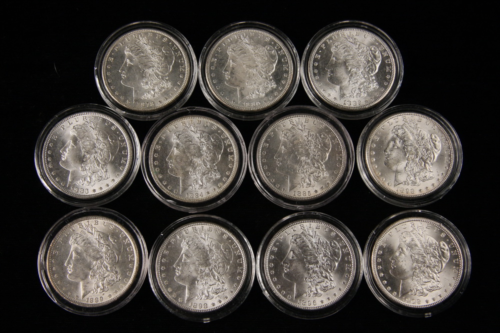 COINS - (11) Morgan silver dollars: