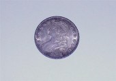 COINS: 1831 Bust Half Dollar.