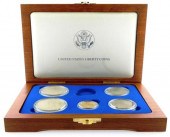 COINS: 1987 "5" PIECE STATUE O