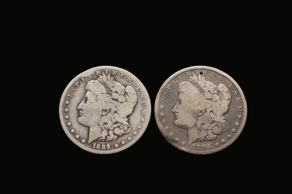 COINS - (2) Morgan silver dollars