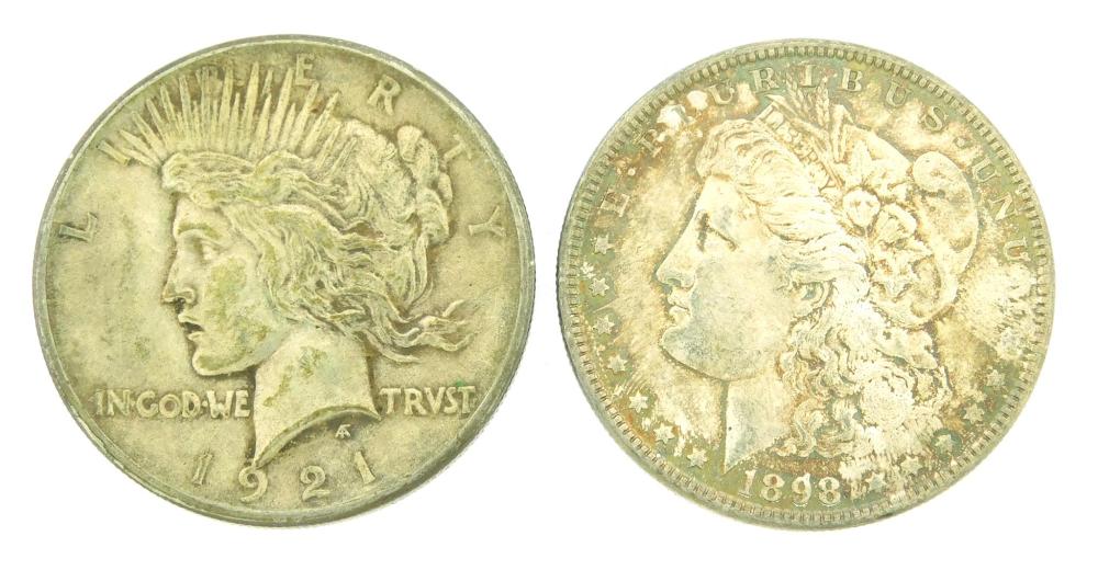 COINS: LOT OF TWO SILVER DOLLARS.