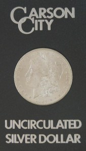 COINS: ONE 1884-CC SILVER DOLL