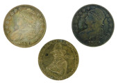 COINS: THREE US HALF DOLLARS,