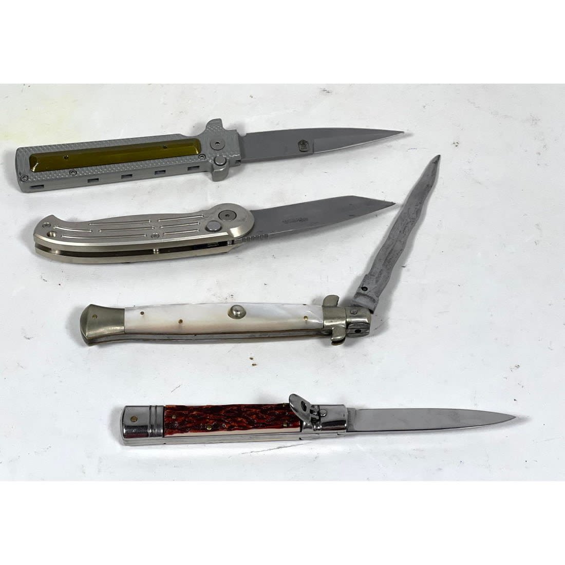Collection 4 Pocket Knives.