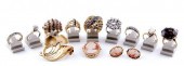 Collection gold rings brooches