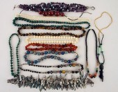 COLLECTION OF 13 BEADED COSTUM