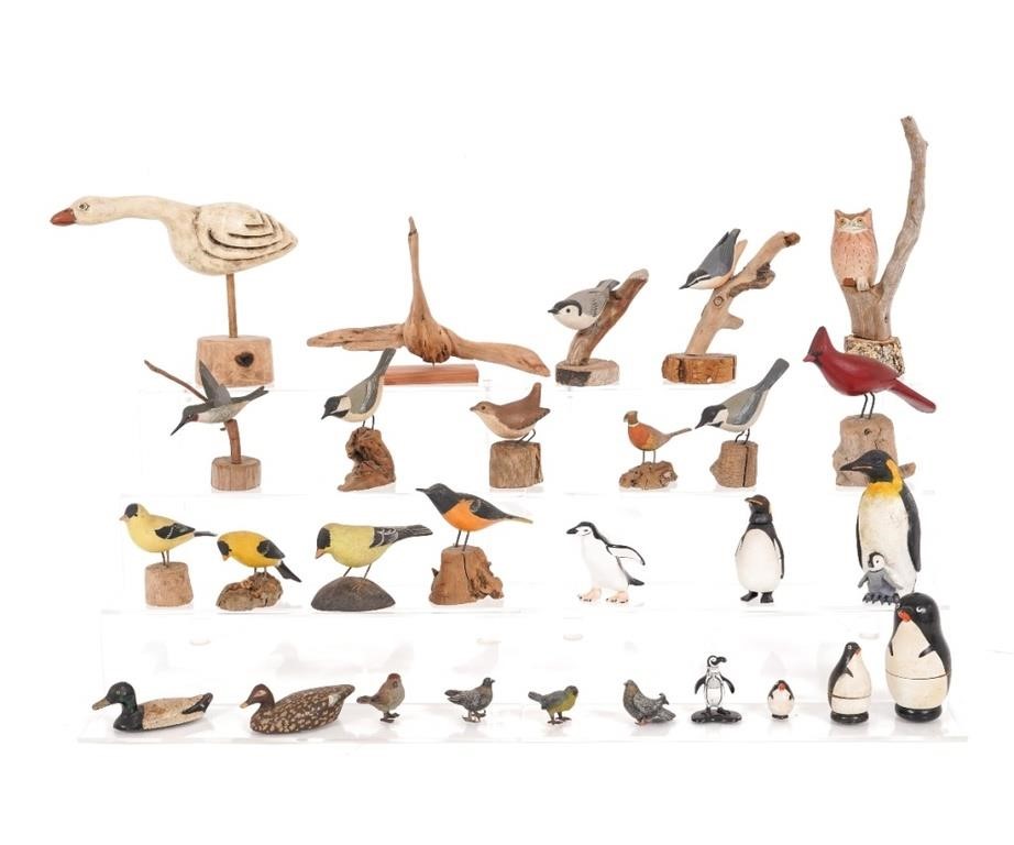 Collection of 26 carved wood and